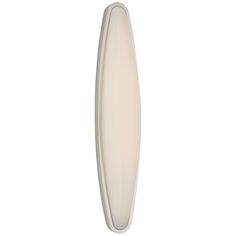 an oval shaped light fixture on a white background