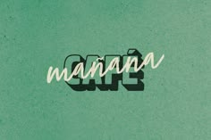 the word wannan is written in white ink on a green background with black and white lettering