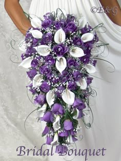 a bridal bouquet with purple and white flowers