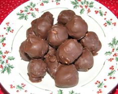 a white plate topped with chocolate covered candies