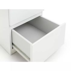 a white cabinet with two drawers and one drawer open