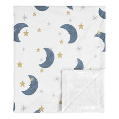 a white blanket with stars and crescents on it, in front of a white background