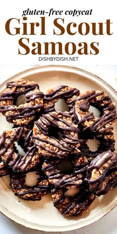 a white plate topped with chocolate covered pretzels