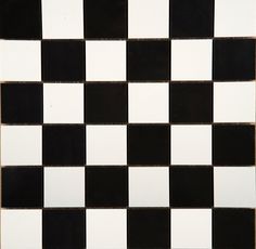 a black and white checkered tile pattern is shown