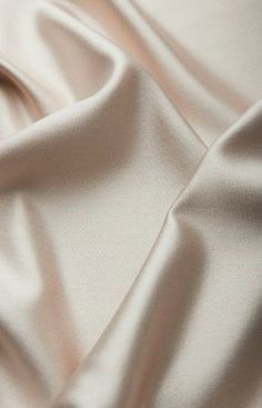 a close up view of a plain white fabric