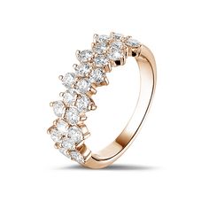 a rose gold ring with five pear shaped diamonds