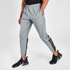 Nike Phenom Essential Men’s Dri-Fit Running Pants Limited Edition. Brand New with Tag Final Sale. Big Discount! FREE Expedited Shipping Product Features A VERSATILE FAVORITE GETS A STRETCHY UPDATE The Nike Essential Pants are updated with recycled materials and plenty of stretch. They use a lightweight design ideal for layering or wearing solo. This product is made with at least 75% recycled polyester fabric. Run Light Woven fabric is lightweight for running without the bulk. lt's powered by Dri Nike Stretch Bottoms For Jogging, Nike Running Bottoms With Pockets, Casual Running Pants With Pockets, Functional Nike Gray Bottoms, Nike Jogging Bottoms Long Pants, Nike Stretch Sportswear Pants, Gray Running Bottoms With Pockets, Nike Full-length Gym Bottoms, Nike Full Length Gym Bottoms