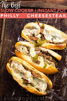 the best slow cooker / instant pot philly cheese steak sandwiches are on a baking sheet