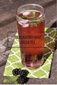 blackberry - mint green tea in a glass on a table