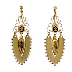 Rare Victorian earrings with mottled and shiny textures. High style urn form pendants with black enamel to match fleur de lis motifs above. Entire earring is articulated to move with wearer. Circa 1870s.
 Excellent condition,6cm x 2cm. Screw back fittings. 2.5" x .75". Asian Gold Jewelry, Gold Jewelry Antique, Victorian Drop Earrings, Byzantine Jewelry, Pearl Pendant Earrings, Victorian Jewellery, Contemporary Earrings, Diamond Dangle Earrings, Jewelry Antique