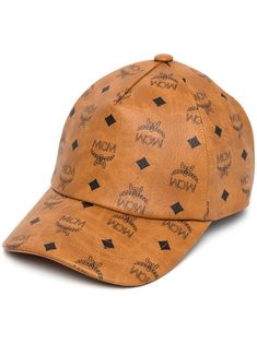 Visetos monogram print cap from MCM featuring cognac brown, black, canvas, signature Visetos print and curved peak. | MCM Visetos monogram print cap Luxury Adjustable Brown Baseball Cap, Designer Brown Baseball Cap, Designer Brown Visor Baseball Cap, Designer Brown Hat With Embroidered Logo, Luxury Baseball Cap With Logo And Curved Brim, Luxury Brown Baseball Cap With Curved Visor, Luxury Brown Hat With Embroidered Logo, Luxury Brown Visor Baseball Cap, Classic Brown Baseball Cap With Curved Visor