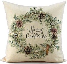 a christmas pillow with pine cones and evergreens on it, which reads merry christmas