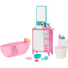 a toy bathroom with sink, toilet and bathtub