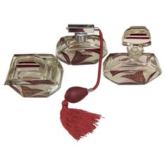 Vanity set composed of perfume bottle and eau de toilette spray and a soap container in transparent glass and tulip patterns in burgundy. Art Deco style Paris, circa 1920. Soap Container, 20th Century Art, Glass Vanity, Art Deco Glass, Perfume Lover, French Art Deco, French Art, Vanity Set, Perfume Bottle