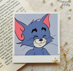 a card with an image of a blue cat on it's face and the words happy birthday