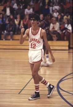 a basketball player is giving the thumbs up