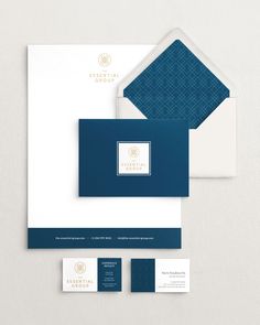 the stationery and business cards are designed to look like they have been made in blue