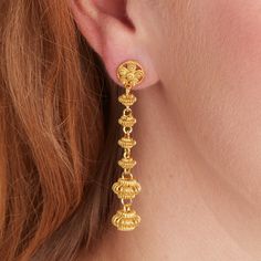 A fabulous long stud drop  gold earring with an antique flavour, but a contemporary elegant subtle boho look.  All the materials I use are real Sterling Silver and 18 carat gold. I do not use inferior metals such as Gold fill or Brass Gold plated! Each gold bead is handmade using a filigree technique, and is a nod to a romantic Byzantine or ethnic culture.  We have graduated the size of the beads to create a more glamorous and subtly elegant style. They swing beautifully as you move and bring an air of freedom and joy to the wearer. These fab gold earrings cross over from a boho to an elegant and antiquey style and weve used matt gold which shines a lovely light on the face. Great for a celebration, wedding or party, going out on the town, a gift for your girlfriend or just for you! Light Long Drop Earrings Gold, Gold Hanging Earrings Indian, New Necklace Designs, Gold Long Earrings, Real Gold Earrings, Stud Drop Earrings, Earrings Cross, Gold Dangle Earrings, Filigree Earrings