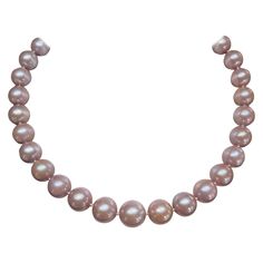 14k yellow gold freshwater Edison natural pink pearl necklace. The length of this necklace is 18 inches, the width is 13-15 mm, has a pearl clasp to open and close, and it has a total weight of 114.1 grams. Luxury Pink Single Strand Pearl Necklace, Vintage Pink Pearl Necklaces, Luxury Pink Baroque Pearl Necklaces, Pink Baroque Pearl Single Strand Necklace, Pearl Clasp, Pink Pearl Necklace, Vintage Yellow Polished Beads, Pink Pearl, Fresh Water