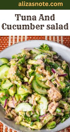 tuna and cucumber salad in a white bowl on a woven place mat with text overlay