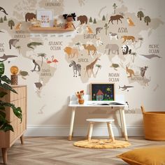 a child's room with a map of the world on the wall and toys