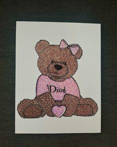 a brown teddy bear sitting on top of a piece of paper with the word diy written on it