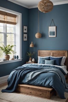 a bedroom with blue walls and wooden furniture