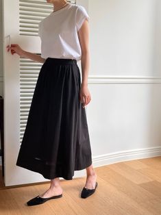 Luxe cotton skirt made from 100% cotton. Midi length, voluminous skirt. Model is in MINUSEY ONE SIZE. ✔️ Free worldwide express shipping over $100✔️ Loved by 6,500+ customers✔️ Limited edition collections, maximum style⠀⠀⠀⠀⠀⠀⠀⠀⠀Stay ahead of the trend with can’t-find-anywhere-else staples. Your closet will thank you 💕 * MINUSEY ONE SIZE = EU 34 -38, US 2-6* 100% Cotton* Dry clean* Made in Korea - Model Height: 172cm/5'7" (US2, EU34) Black Cotton Flared Skirt, Cotton Voluminous Maxi Skirt For Work, Black Cotton Maxi Skirt Relaxed Fit, Black Voluminous Cotton Maxi Skirt, Cotton Workwear Maxi Skirt With Gathered Detail, Cotton Flared Maxi Skirt For Work, Black Cotton Pleated Skirt With Lining, Black Flared Cotton Pleated Skirt, Cotton Long Pleated Daywear Skirt