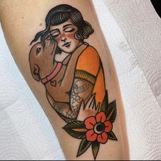 a woman with a horse tattoo on her leg and the caption says, for the win tatoo co