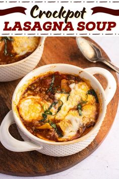 two bowls of crockpot lasagna soup on a wooden board