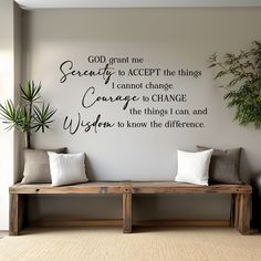 a living room with a wall decal that says god grant me serenity to accept the things i cannot change