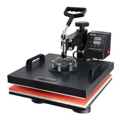 the heat press machine is on top of an orange and black plate with red trimmings