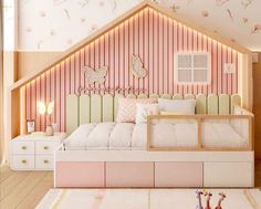 a bedroom with pink and white decor in the shape of a doll house, made to look like a child's bed