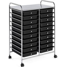 a metal cart with many drawers on it