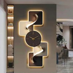 a large clock mounted to the side of a wall next to a living room filled with furniture