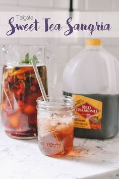 two mason jars filled with sweet tea sangria