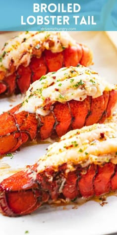 cooked lobster tails on a white platter with parsley garnish and mayonnaise