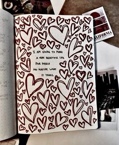 an open notebook with lots of hearts on it and the words i am going to make