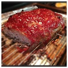 the meatloaf is covered with sauce and ready to be cooked in the oven