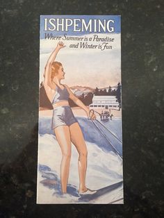 a book with an image of a woman on skis