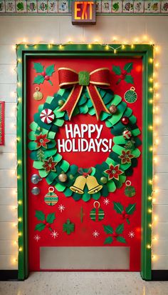 a red door decorated with green wreaths and lights that says happy holidays on it