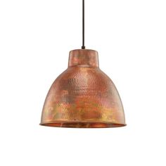 a copper colored light hanging from a ceiling