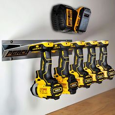 a bunch of tools hanging on a wall