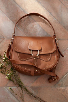 An every day purse with international flair, the Aurora leather and suede bag is artisan crafted in Italy for many years of use. Medium Purse, Crossbody Saddle Bag, Purse Crafts, Leather Patterns, Suede Bag, The Aurora, Leather Pattern