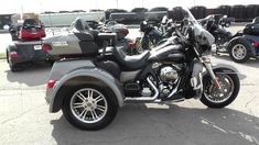 several motorcycles are parked in a parking lot