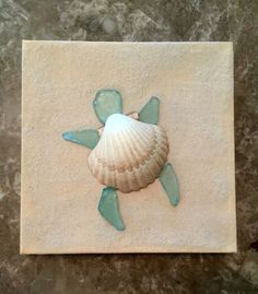 Turtle canvas - painted canvas with real sand added then turtle made out of… Summer Crafts And Activities, Seaglass Picture, Seaglass Ideas, Shell Artwork, Beach Week, Mermaid Room, Beach Bathroom, Paintings Acrylic