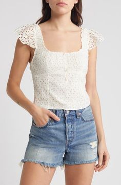 Turn on the romance in this top with a layer of pretty eyelet defining the fitted silhouette and forming the barely there cap sleeves. 17" length (size Medium) Button half placket Square neck Cap sleeves Partially lined 100% cotton Hand wash, dry flat Imported Chic Sleeveless Eyelet Top, Chic Sleeveless Top With Eyelet Details, Fitted Feminine Eyelet Top, Fitted Short Sleeve Top With Broderie Anglaise, Spring Tops With Broderie Anglaise, Fitted Broderie Anglaise Short Sleeve Top, Fitted Broderie Anglaise Tops For Spring, Casual Sleeveless Eyelet Top, Fitted Eyelet Top For Spring