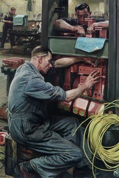 two men working on machinery in a factory