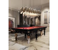 a pool table in the middle of a room with chandeliers hanging from the ceiling