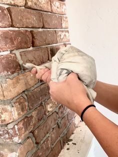 Brick Veneer Wall, Painted Concrete Steps, Brick Accent Wall, Brick Accent Walls, Painting Front Porch, Black Brick Wall, Brick Store, Brick Interior Wall